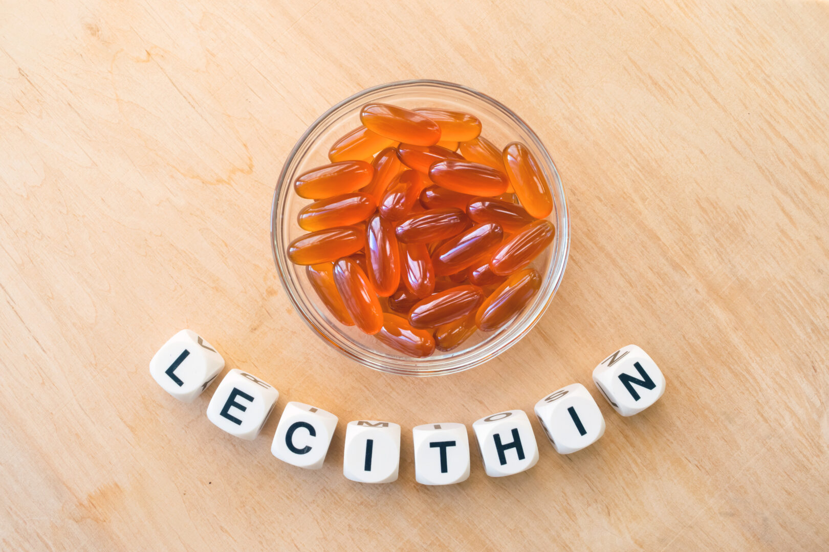 Lecithin gel pills in a round glass bowl and with the word Lecet